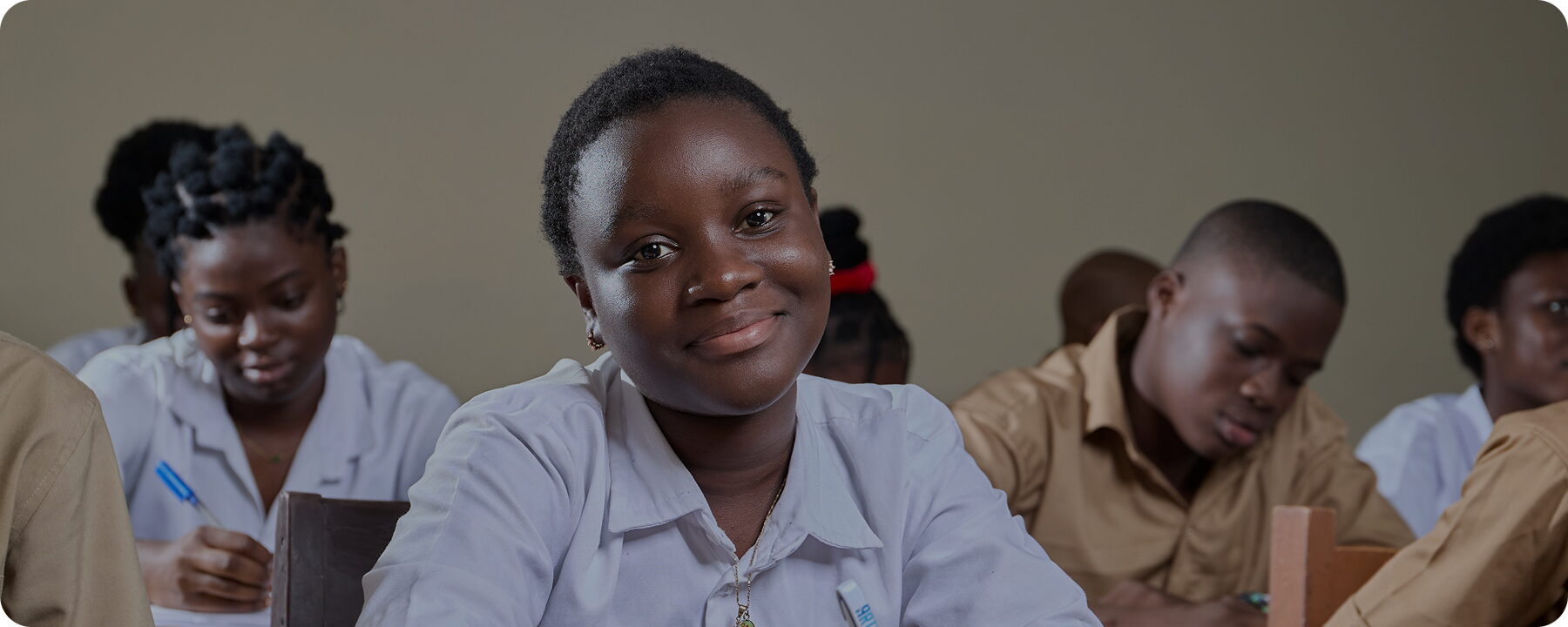 FGC Kano students in uniform working at their desks in a bright classroom