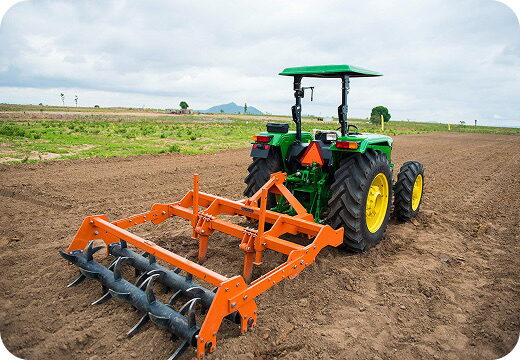 A tractor ploughing farmland
